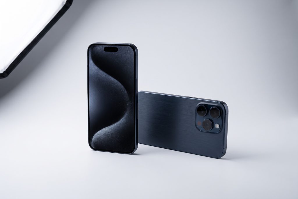 Two iPhone 17 Pro Max handsets in blue titanium